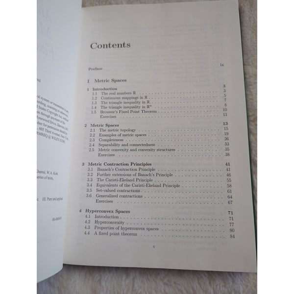 An Introduction to Metric Spaces and Fixed Point Theory Mohamed A. Khamsi HC