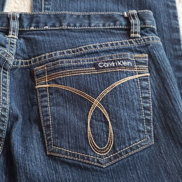 Calvin Klein Jeans Dark Wash Mid Rise Flare Blue Jeans Size 4 Waist 29.5 Inches