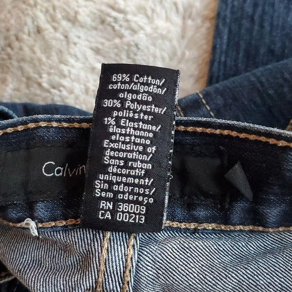 Calvin Klein Jeans Dark Wash Mid Rise Flare Blue Jeans Size 4 Waist 29.5 Inches